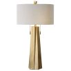 Inverted star shape brass lamp base with light beige linen shade
