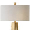 Inverted star shape brass lamp base with light beige linen shade