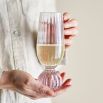 Ribbed champagne flute with unique silhouette