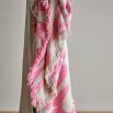 Pink and cream throw with fringing details