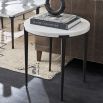 Round side table with marble top and black legs