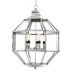 A large luxury lantern by Eichholtz with a bevelled glass and nickel finish 