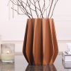Stunning vase composed of brown leather and glass