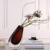Adaptable brown glass vase in elegant and smooth design