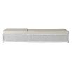 Cream outdoor lounger with foam seat and plastic base