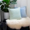 A beautiful, airy light blue velvet cushion 
