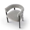 Elegant boucle upholstered dining chair in grey with black frame