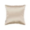 A beautiful cushion by Romo with a pink velvet finish and a cream-coloured satin reverse complete with pompom fringed details