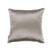 A beautiful velvet cushion by Romo with an embroidered pattern and neutral finish with a satin reverse and lovely fringing