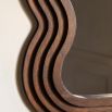 Brown wooden mirror with wavy edge frame