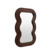 Brown wooden mirror with wavy edge frame