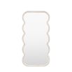 Full length mirror with a wavy edge detailing