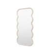Full length mirror with a wavy edge detailing