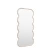 Full length mirror with a wavy edge detailing