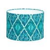 A stunning lampshade by Eva Sonaike with a turquoise African-inspired pattern