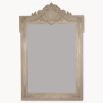 Opulent wall mirror with ornate crest detail in distressed brown finish