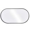 Vintage style bronze mirror in a classic capsule shape