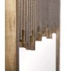 Rectangular mirror fashioned with staggered channels of textured antique brass clad