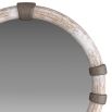 Lime-washed wooden mirror punctuated with bands of bronzed brass