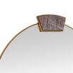 Slim round mirror with jewellery like detail at its top