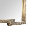 Striking mirror was brass finish frame in geometric silhouette
