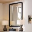 The Gregory Mirror combines vintage-inspired patterns with ebonized mango wood, designed to catch light and display in any orientation.