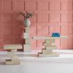 Eye-catching stacked cubist console table in ivory finish
