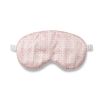 A glamorous silk eye mask with a rattan pink design on a gorgeous ivory background and complete with a drawstring pouch