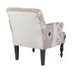 Bohemian-style patterned accent chair with tufted wool details 