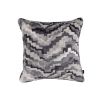 A unique and quirky velvet cushion with a distinctive zigzag design 