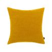 A bright and vibrant mustard coloured cushion with a luxurious velvet finish and soft texture
