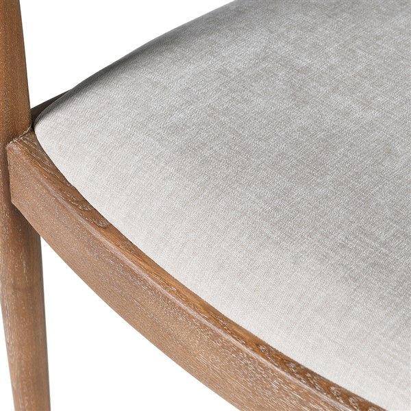 Wooden frame dining chair with curved design and white upholstered seat