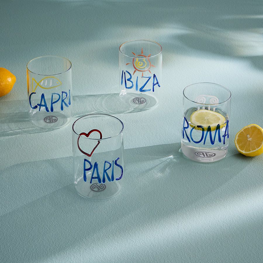 The Jet Set Glassware Set is hand-blown with unique designs inspired by global destinations, adding an evocative touch to your cocktail hour.