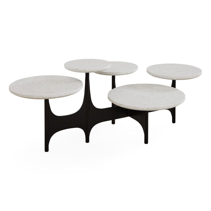 The Milano Cocktail Table combines five terrazzo tabletops with a sculptural steel base, requiring no styling to be the room’s focal point.