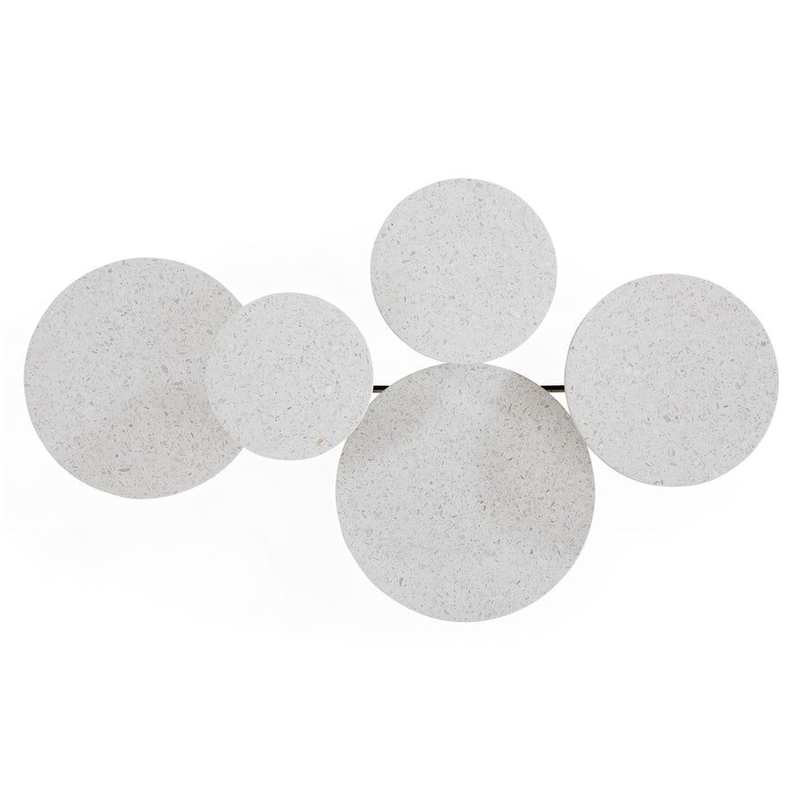 The Milano Cocktail Table combines five terrazzo tabletops with a sculptural steel base, requiring no styling to be the room’s focal point.