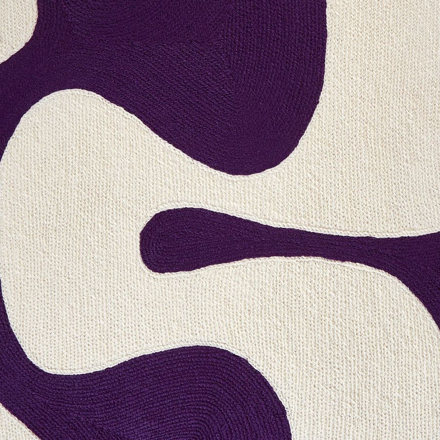 Square cushion with purple abstract artwork