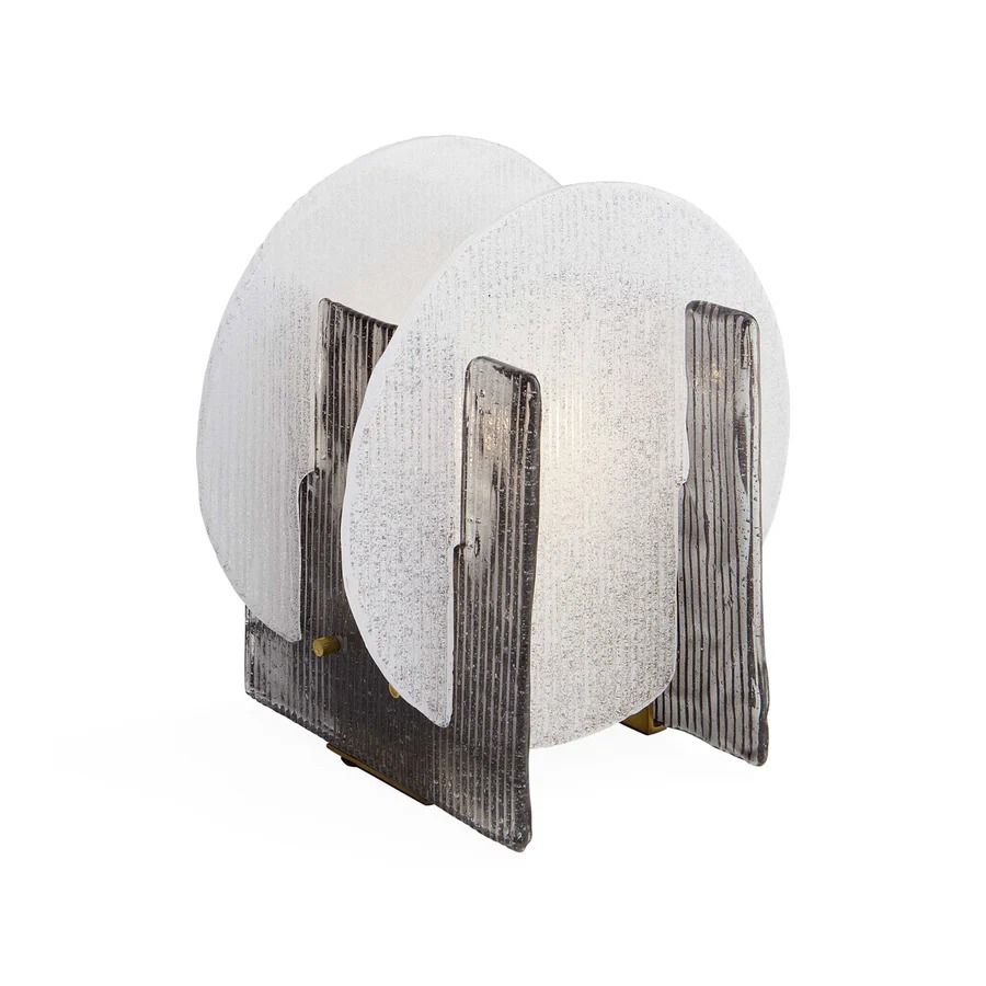 Illuminate your space with the stylish Rialto Table Lamp, featuring a modern design that adds elegance and warmth to any room. Perfect for your decor!