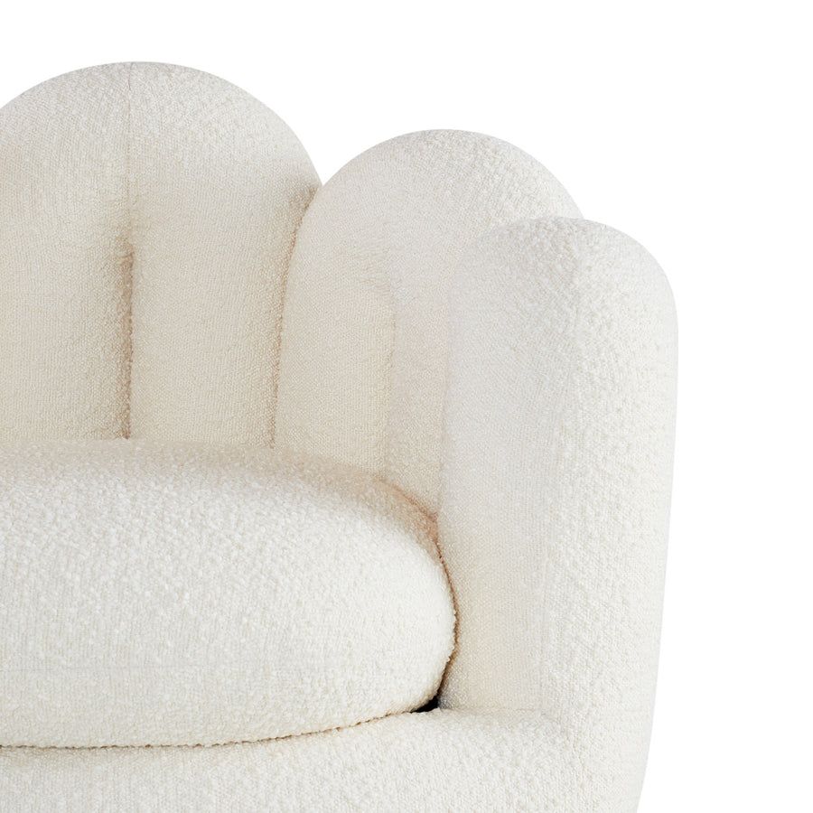 Soft cream chair cradled by tube