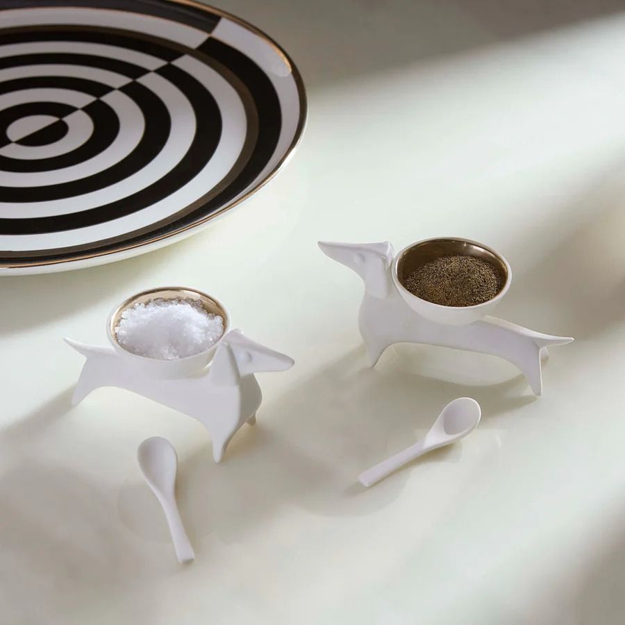 Add a playful touch to your kitchen with our Dachshund Salt & Pepper Cellars. Perfect for dog lovers and a charming decor accent!