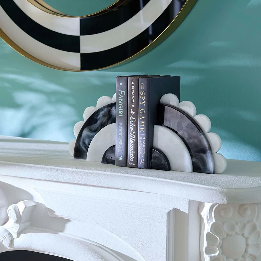 Elevate your bookshelf with Como Bookends in chic black and white. Stylish and functional, they keep your books organized and add modern flair.