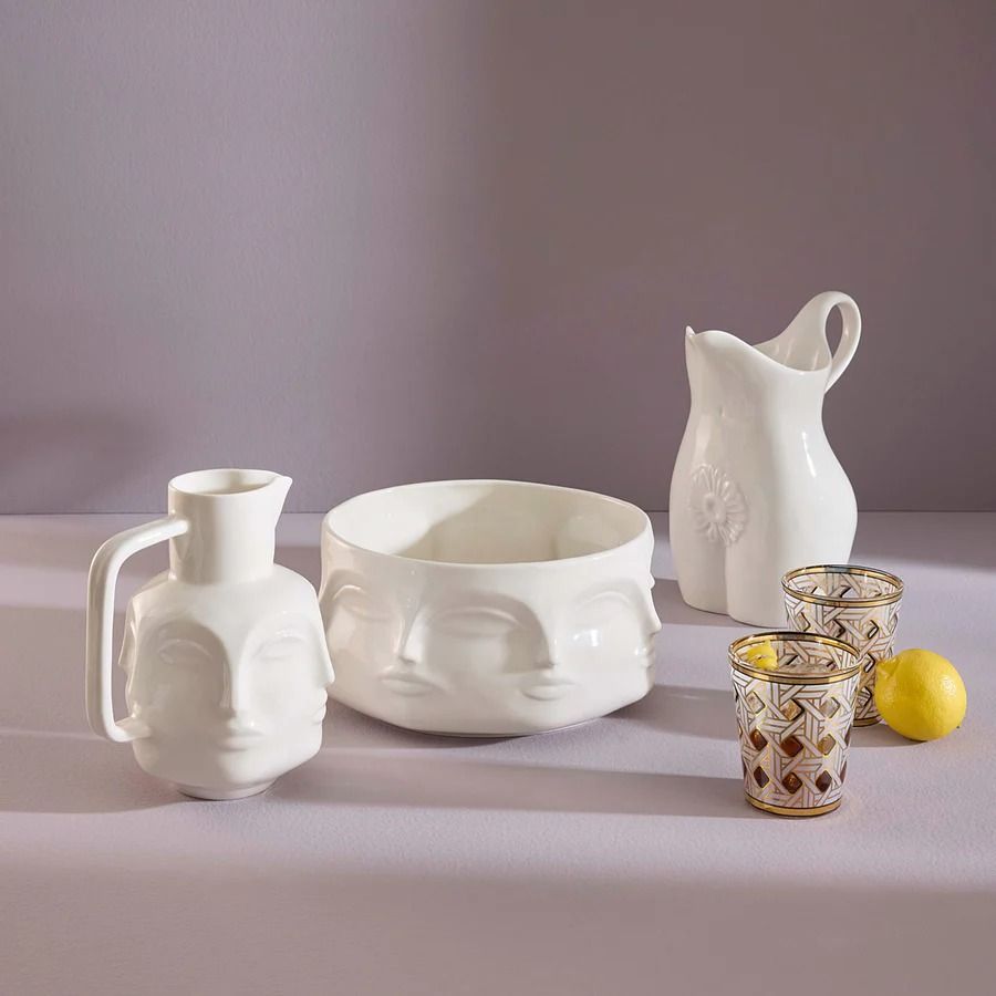 Discover the Edie Pitcher: a stylish, versatile addition to your kitchen. Perfect for serving beverages or as a decorative accent. Elevate your dining experience!