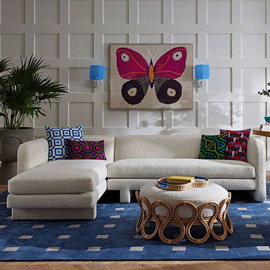 Square multicoloured cushion with geometric artwork