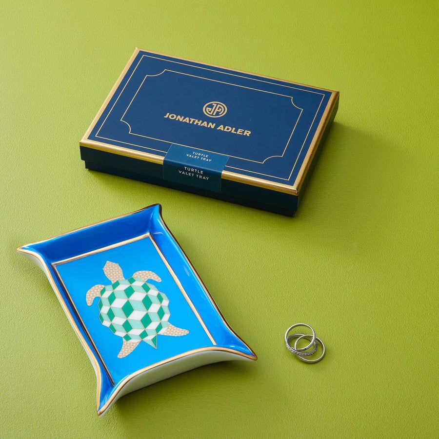 Blue porcelain tray with angled sides and turtle artwork