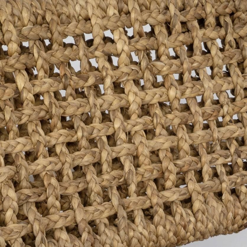 Rattan chair with accentuated wooden arms