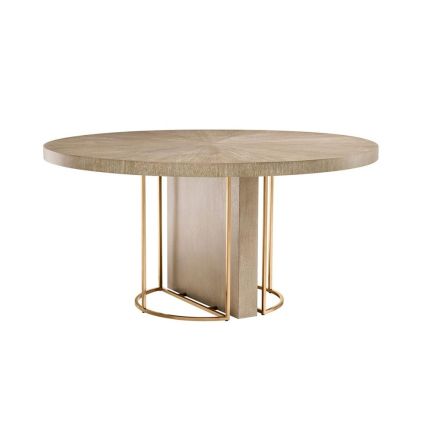 Light brown washed oak circular dining table with brass legs