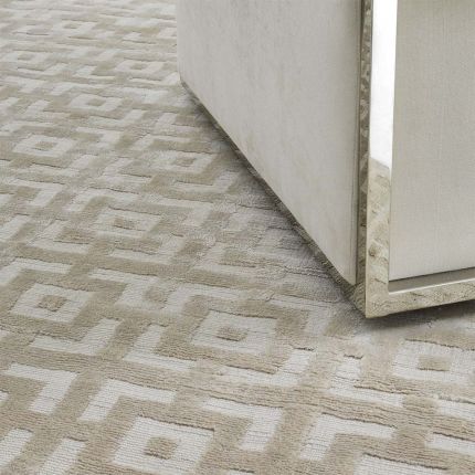 A gorgeous, silk-like natural patterned carpet by Eichholtz  