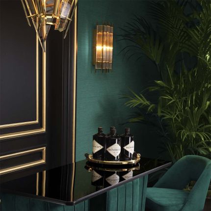 Gorgeous art deco inspired wall lamp in a gold finish.