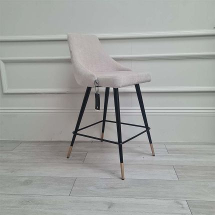 Velvet counter stool in a sand finish.