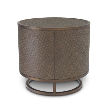 A stylish dark oak side table with a bronze frame