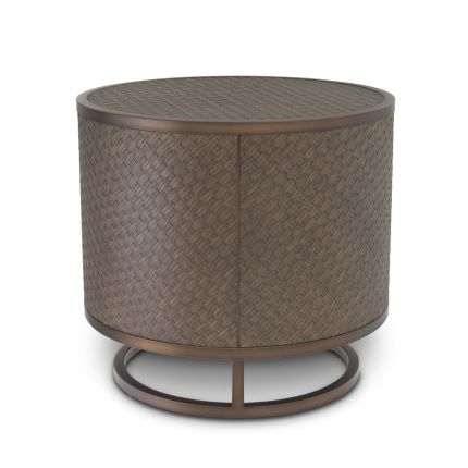 A stylish dark oak side table with a bronze frame